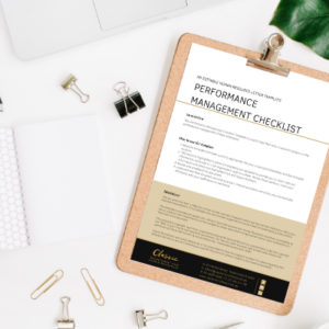 Performance Management Checklist printed on a clipboard.